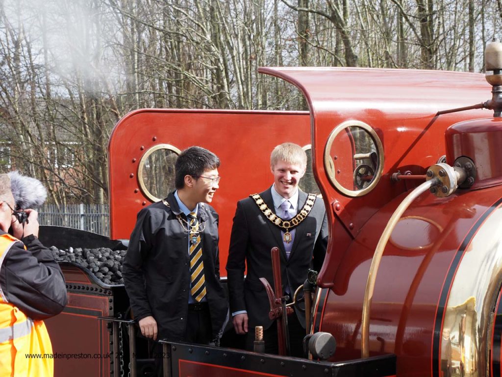 The Mayor of Preston, Neil Derby and Mayor's Consort Dan Leung, on Furness Trust loco 20. The oldest working loco in Britain. At the Ribble Steam Railway on 25th March 2023.